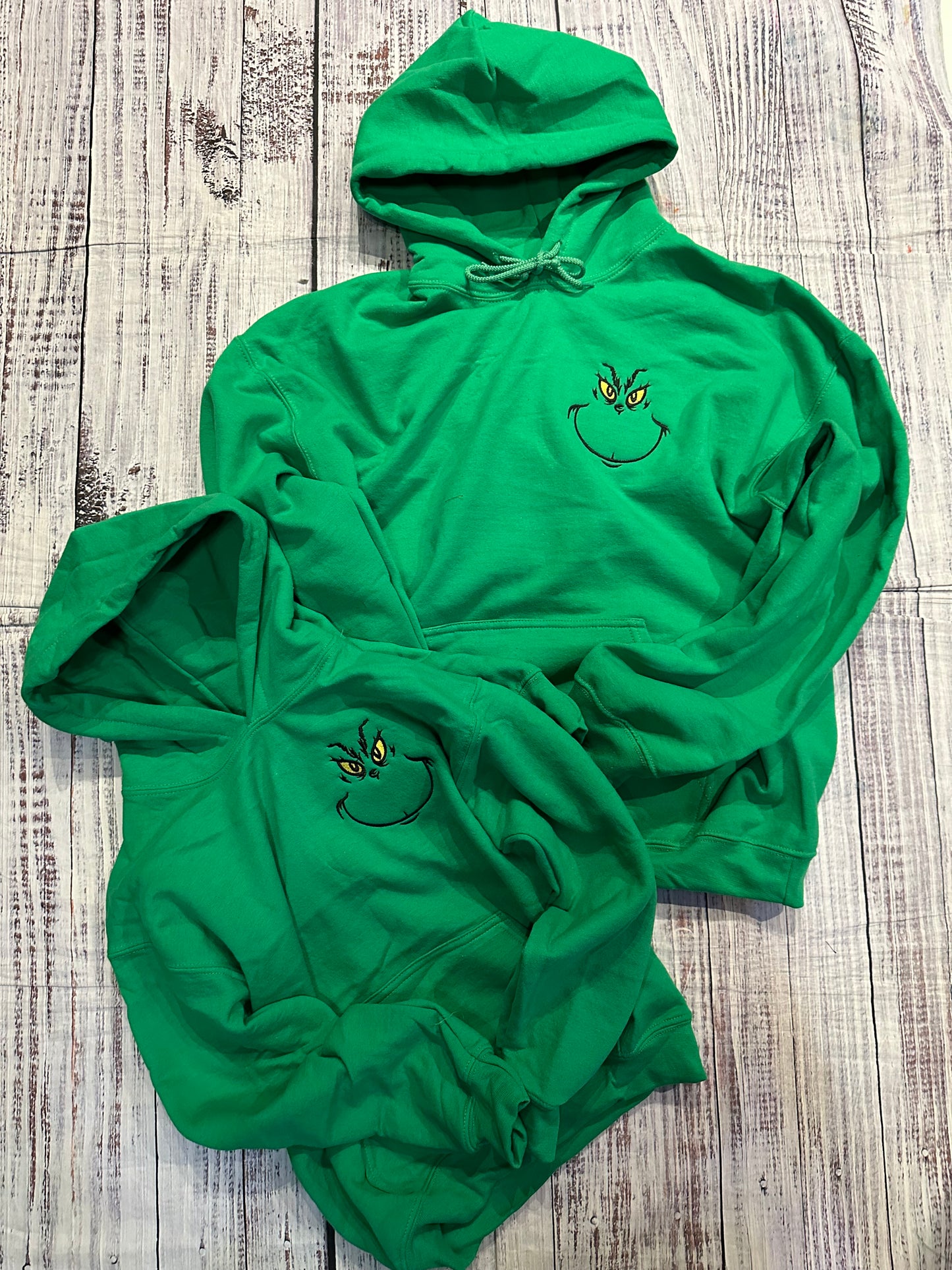 Embroidered green guy hoodie