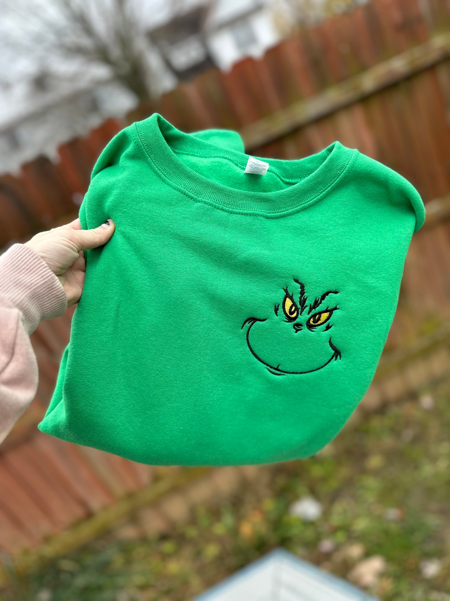Embroidered green guy crew